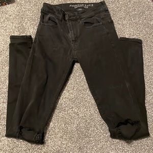 Black AE skinny jeans